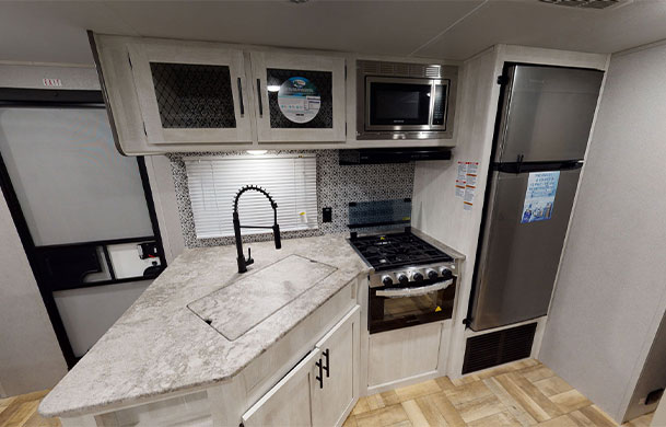 Premium RV rental kitchen at Adventure Bound Southwoods